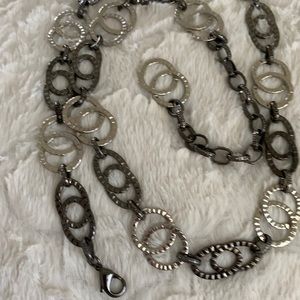 Dress belt.Silver tone and black